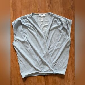 Elegant Light Blue Women's Wrap Top, sleeveless